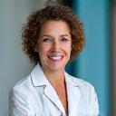 Portrait of Dr. Evelyn Reed, a physical therapist, in a professional setting.